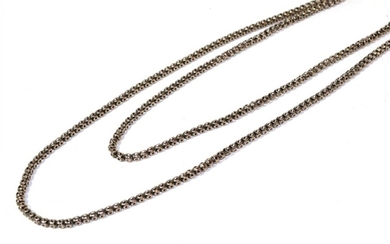 A guard chain, with applied plaque stamped '9CT, length 104cm...