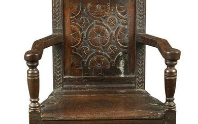 A joined oak caqueteuse type open armchair, 17th century