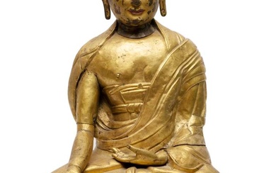 A large Tibetan repoussé gilded copper Buddha Bhaiṣajyaguru