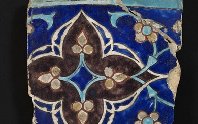 NOT SOLD. A large Timurid cuerda seca pottery tile decorated in blue, turquoise, white, aubergine and gold with flowers and design. Iran, 15th century. C. 33 x 32 cm. – Bruun Rasmussen Auctioneers of Fine Art