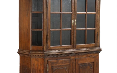 A late 18th century Louis XVI oak cabinet, front with two glass...