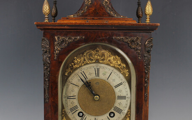 A late 19th century brass mounted burr walnut cased mantel clock with eight day movement striking ho