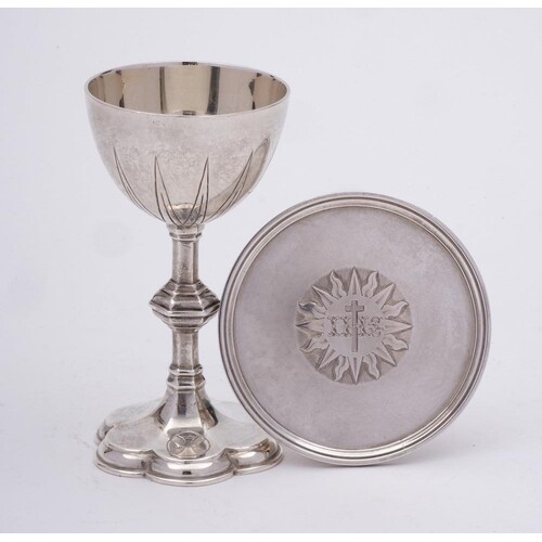 A matched silver travelling two piece communion set: the pat...