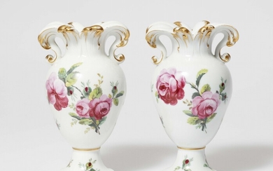 A pair of Berlin KPM porcelain vases with rose decor