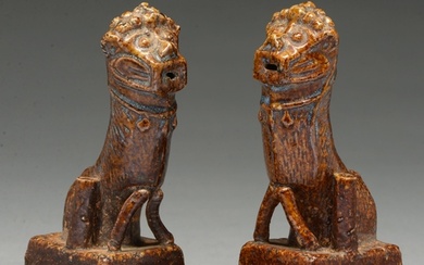 A pair of Chinese brown glazed earthenware dog of Fo incense...