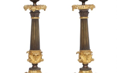 A pair of French 19th century Charles X patinated and gilt bronze...
