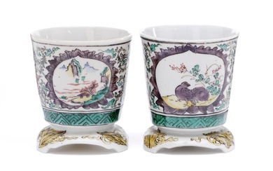 A pair of French Samson porcelain cups, decorated with cartouches framed by...