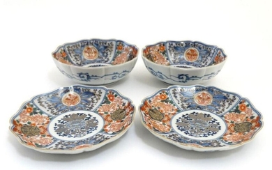 A pair of Japanese Imari plates and matching pair of