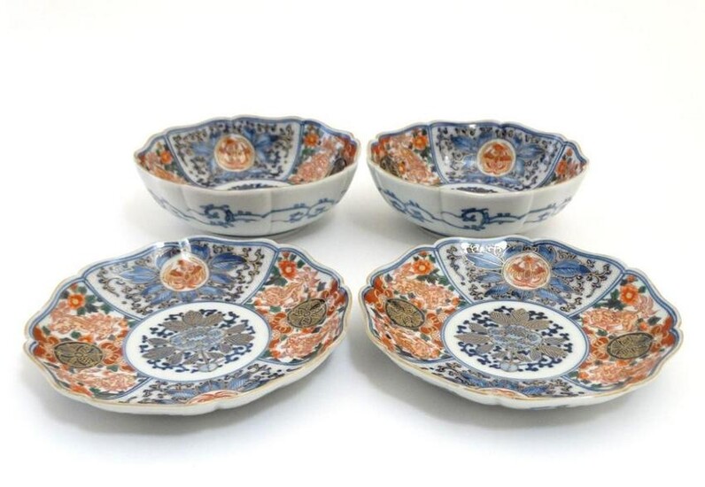 A pair of Japanese Imari plates and matching pair of