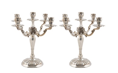 A pair of Spanish silver candelabra