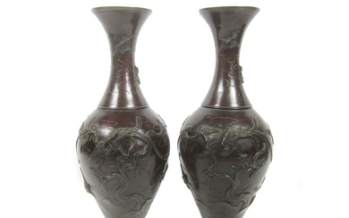 A pair of bronze vases