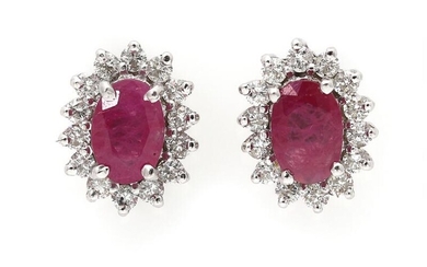 NOT SOLD. A pair of ear studs each set with a ruby encircled by numerous diamonds, mounted in 14k white gold. (2) – Bruun Rasmussen Auctioneers of Fine Art