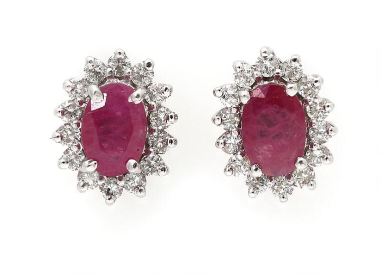 NOT SOLD. A pair of ear studs each set with a ruby encircled by numerous diamonds, mounted in 14k white gold. (2) – Bruun Rasmussen Auctioneers of Fine Art