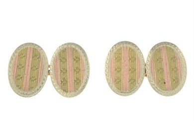 A pair of early 20th century 9ct tri-colour gold patterned cufflinks.
