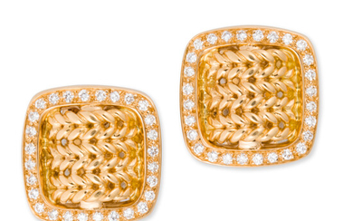 A pair of eighteen karat gold and diamond earclips, Hermès