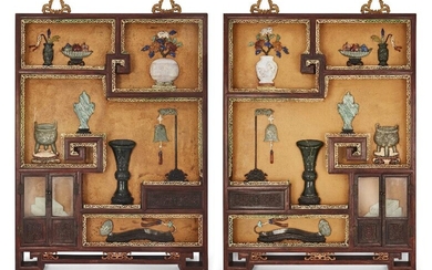 A pair of large Chinese lacquered jade and hardstone inlaid 'trompe l'oeil' display cabinet panels, late Qing dynasty, formed as a pair of rosewood display shelves with pierced ivory borders housing carved 'precious' vessels with ivory and carved...