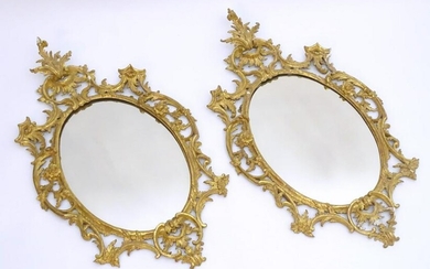 A pair of late 19thC / early 20thC gilt mirrors with