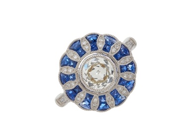 A platinum circular-cut diamond and calibre-cut sapphire dre...