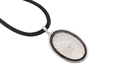 A rock crystal and diamond pendant necklace