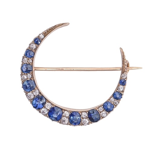 A sapphire and diamond brooch, c1900, in gold, 35mm diam, 5....