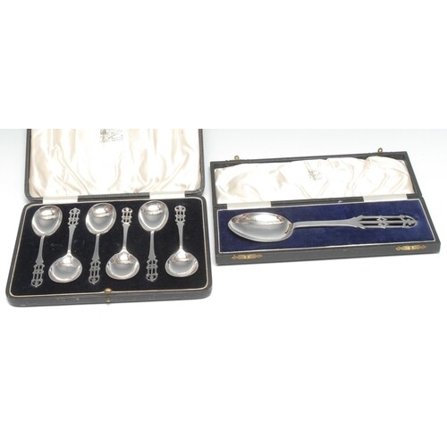 A set of six Arts and Crafts silver fruit spoons, pierced st...