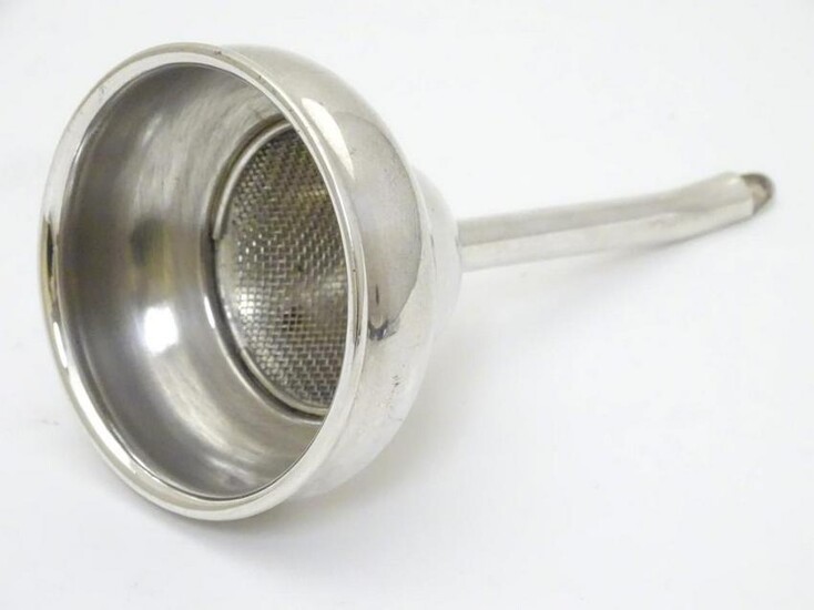 A silver plated wine funnel 5 1/2" long x 3" wide