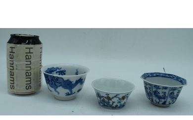 A small Chinese porcelain blue and white dragon bowl with tw...