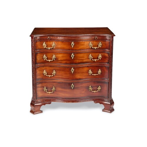 A small George III mahogany serpentine chest The rectangular...