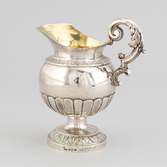 A swedish parcel-gilt silver creamer, mark of Pehr Alfred Weström, Uppsala 1855.