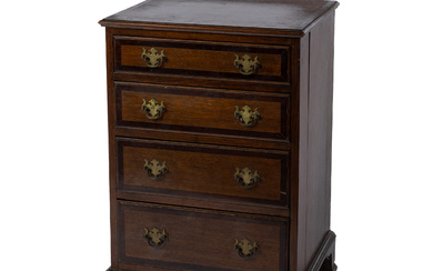 A vintage English Georgian revival oak 4 drawer small chest...