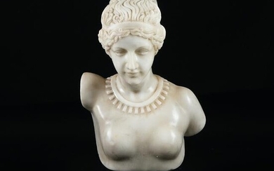 A white marble bust of a lady with necklace