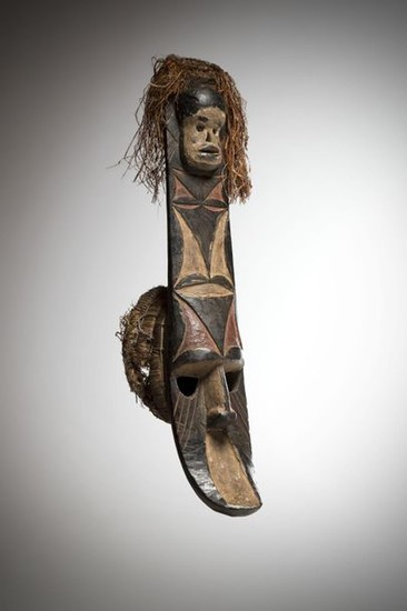 AFIKPO, Nigeria. Polychrome mask with a concave face...