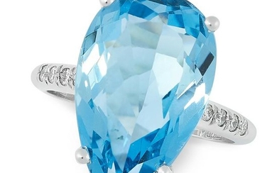 AN AQUAMARINE AND DIAMOND DRESS RING set with a pear