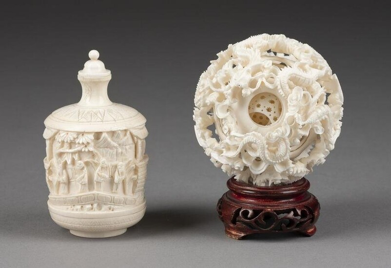 AN IVORY CARVED SNUFF BOTTLE AND A CHINESE PUZZLE BALL