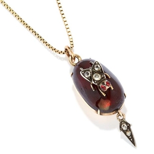 ANTIQUE GARNET AND DIAMOND MOURNING PENDANT in yellow