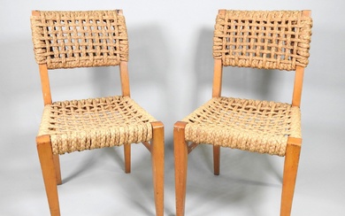 Adrien AUDOUX & Frida MINET dit AUDOUX-MINET (XXe). Paire de chaises en hêtre, les assises...