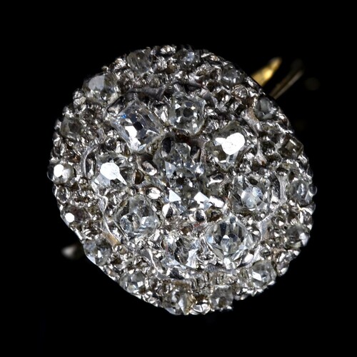 An 18ct gold diamond cluster panel ring, set with 3 rows of ...