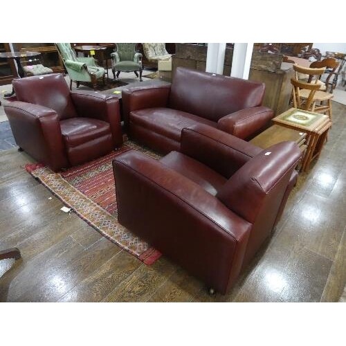 An Art Deco three piece Suite, comprising two seater sofa an...