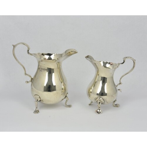 An Edward VIII silver cream jug, in George II pear shaped fo...