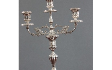 An Elizabeth II Irish-silver candelabrum with some foliate d...