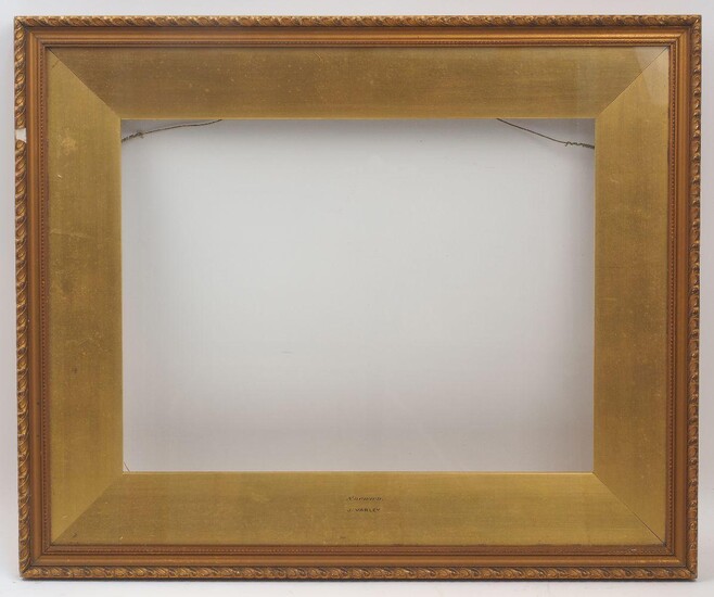 An English Gilded Composition Watercolour Frame, late 19th / early 20th century, with wedge slip, cavetto sight, husk course, plain hollow and gadrooned top edge, the slip inscribed 'Norwich J Varley', glazed, 41 x 51cm. (sight).