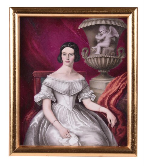 An English porcelain plaque painted with a portrait of a seated woman