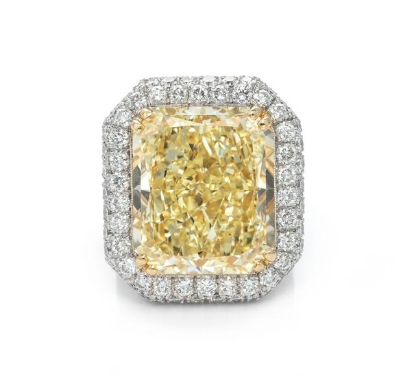 An Exceptional Fancy Yellow Diamond, Platinum and Diamond Ring