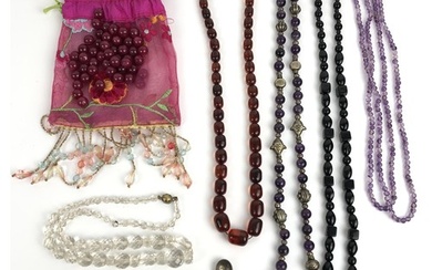 An amber coloured necklace, and assorted costume jewellery