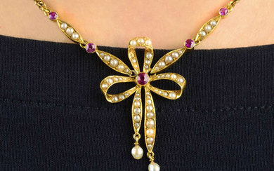 An early 20th century 15ct gold ruby, split and seed pearl bow necklace.