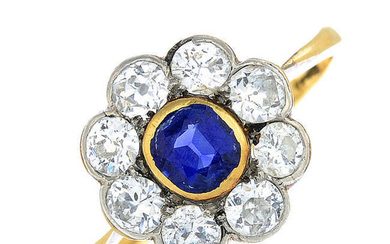 An early 20th century 18ct gold cushion-shape sapphire and vari-cut diamond floral cluster ring.