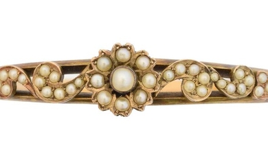 An early 20th century split pearl hinged bangle