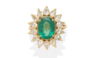 An emerald and diamond ballerina ring