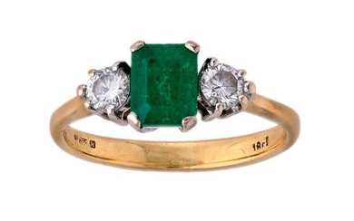 An emerald and diamond ring, centring on a step-cut emerald set between a pair of brilliant-cut diamonds, ring size K