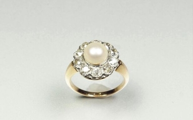 Antique 18K (750/oo) yellow gold and platinum (850/oo) ring centered...